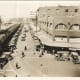 Pike Place Market, Seattle, Washington, circa 1922. Looking up Pike Place, apparently from the roof of the Economy Market. Postcard collection (Record Series 9901-01), Seattle Municipal Archives