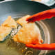 The samosas should be ready when they begin to turn golden brown.