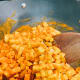 Stir the potatoes with a spatula to combine evenly with the paste.