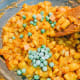 Add the frozen peas and carrots.