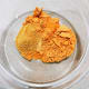 In a small bowl, combine the curry powder, madras curry powder. Add some water and stir to make a paste.