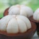An opened mangosteen fruit