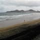 Dark sand at the southern end of Playa de las Canteras.