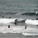 Surfing at the southern end of Playa de las Canteras.