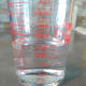 Glass measuring cup.