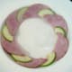 Apple slices and ham are plated