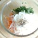 Preparing turnip and carrot salad