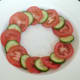 Tomato and pickled cucumber salad border