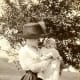 1919 photo of my mother-in-law as a baby with her mother, who is the person getting married in this story.