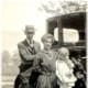 My husband's grandparents and his mother as a child