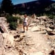 My niece walking amidst the rubble that used to be on top of a mountain in the far distance - Gros Ventre Slide