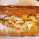 Generously butter the crust.
