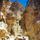 People hiking in Golden Canyon