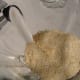Add the toasted seeds and olive oil into the blender