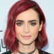 Lily Collins: Blunt bob with wine-red hair.
