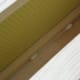 Cotton swab with lemon grass oil left in between frames