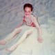 My niece having fun in the white sand
