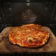 Stick it in the oven and watch it cook, only 8mins until you can eat it!