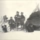 Sami People in the late 1800s, in front of their home.