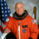 In space at age 77. Senator John Herschel Glenn Jr. flew again on October 29, 1998 for mission STS-95 - US Space Shuttle Discovery.
