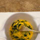 Step 4: Add the wilted spinach and stir.