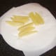 The once fried chips should still be pale in colour