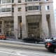 Building on California Street, heading up toward Nob Hill. No, the camera is not tilted; if you count the blocks in the building's columns, you can see there are more on the right than the left.