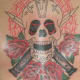 skull tattoos and flowers