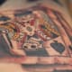 card-tattoo-designs-and-meanings-card-tattoo-variations-and-ideas