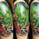 Green hannya tattoo.