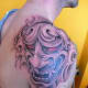 A red-eyed hannya mask.