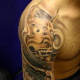 Hannya mask on the shoulder.