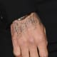 "Victoria" appeared on David's right hand in September 2013.