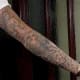 Right arm angel above elbow, flames on lower arm