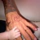 Whether it's "love" of tattoos or love of his new baby daughter, or just his life in general, this piece of ink pretty much sums it up