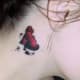 a heart below a person's ear