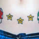 Super Mario mushrooms and Pac-Man stars (Geary Morrill and "CHIMP," Art&Soul Tattoo;Kalamazoo,MI)