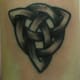 A black triangular knot. (by Michael Truitt, Capital Tattoo, Charlotesville, va)