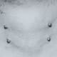 Two Vertical Neck Piercings