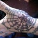 Star in web on hand