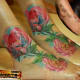 Ankle and foot roses tattoo