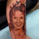 Portrait on inside of upper arm.