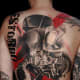 This is a full back piece that would take approximately 14 - 18 hours tattooing. The average price for a quality tattoo this size is $1000 - $1500.