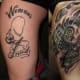 Definitely a "what the hell" moment. The tattoo design that covers it is well done and uses the lines' flow in the old tattoo.