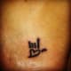 Tiny tattoo with love heart