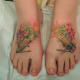 Unique foot tattoos.