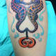 Seahorses on forearm.