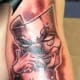 Some tattoos simply feature the masks without the text.