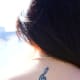 Treble clef tattoo.