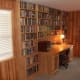 Sewing table built into shelving.